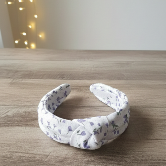 Diadema nudo flores lila